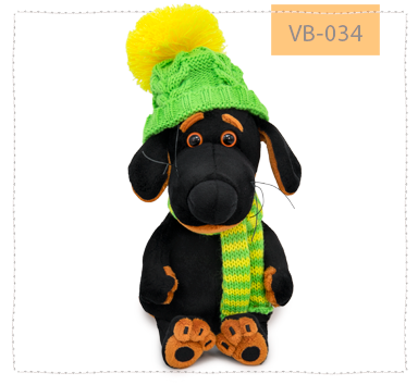 в зеленой шапке и шарфе