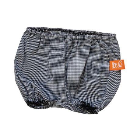 Розовая блузка и брюки в клетку