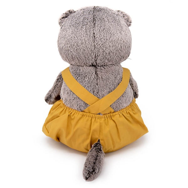 в полукомбинезоне с бантом