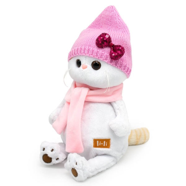 в шапке с бантом и шарфе